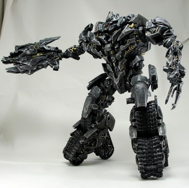  pictures show Megatron in many different poses, his murder arm 