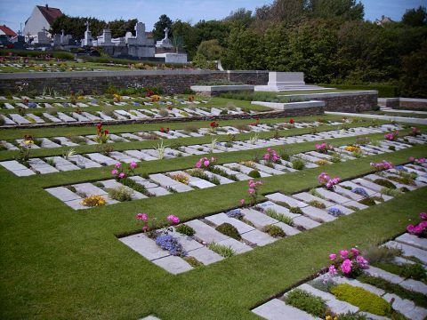   the sandy nature of the soil, the headstones lie flat upon the graves